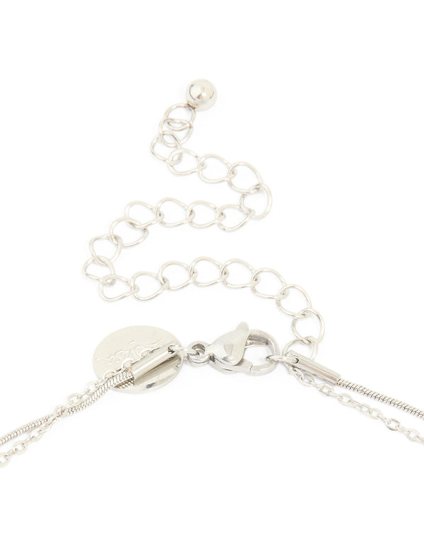 Featuring a waterproof stainless steel multi heart charm layered necklace in silver clasp detail view