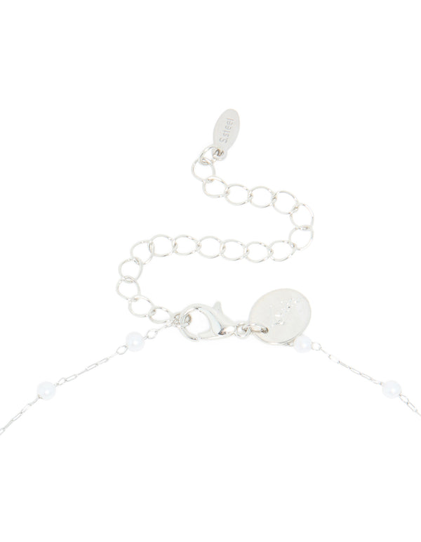 Highlighting the waterproof stainless steel pearl Y-necklace clasp detail view