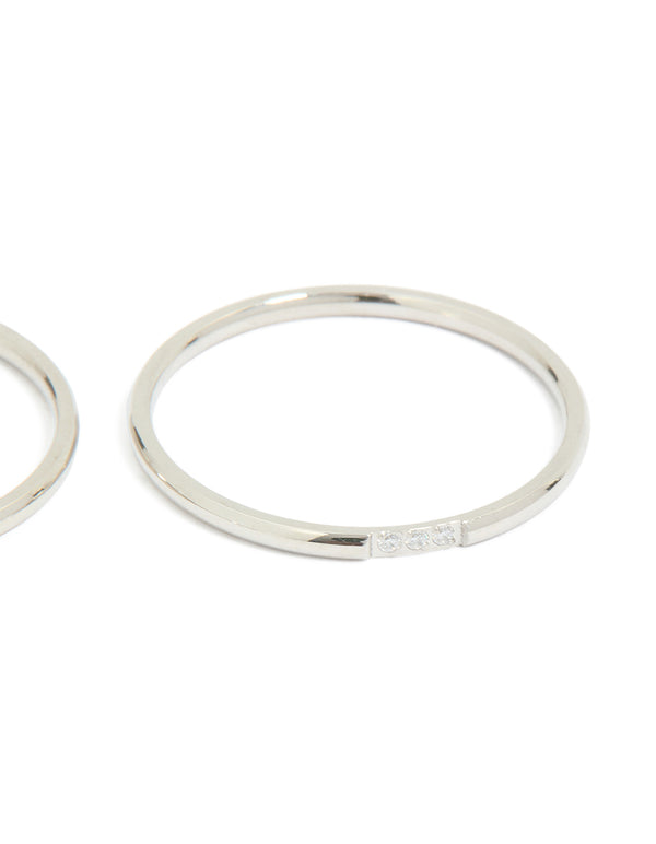 Highlighting waterproof stainless steel material, this thin cubic zirconia trio rings 3-pack in silver and clear stone side detail view
