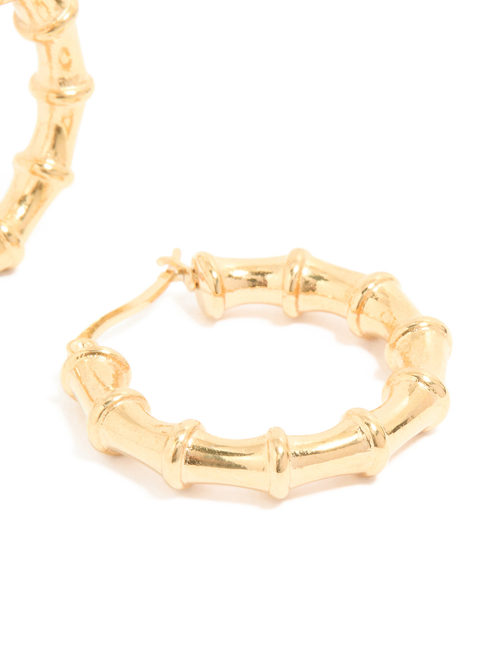 Crafted from waterproof gold plated stainless steel with textured bamboo design statement hoop earrings post detail view