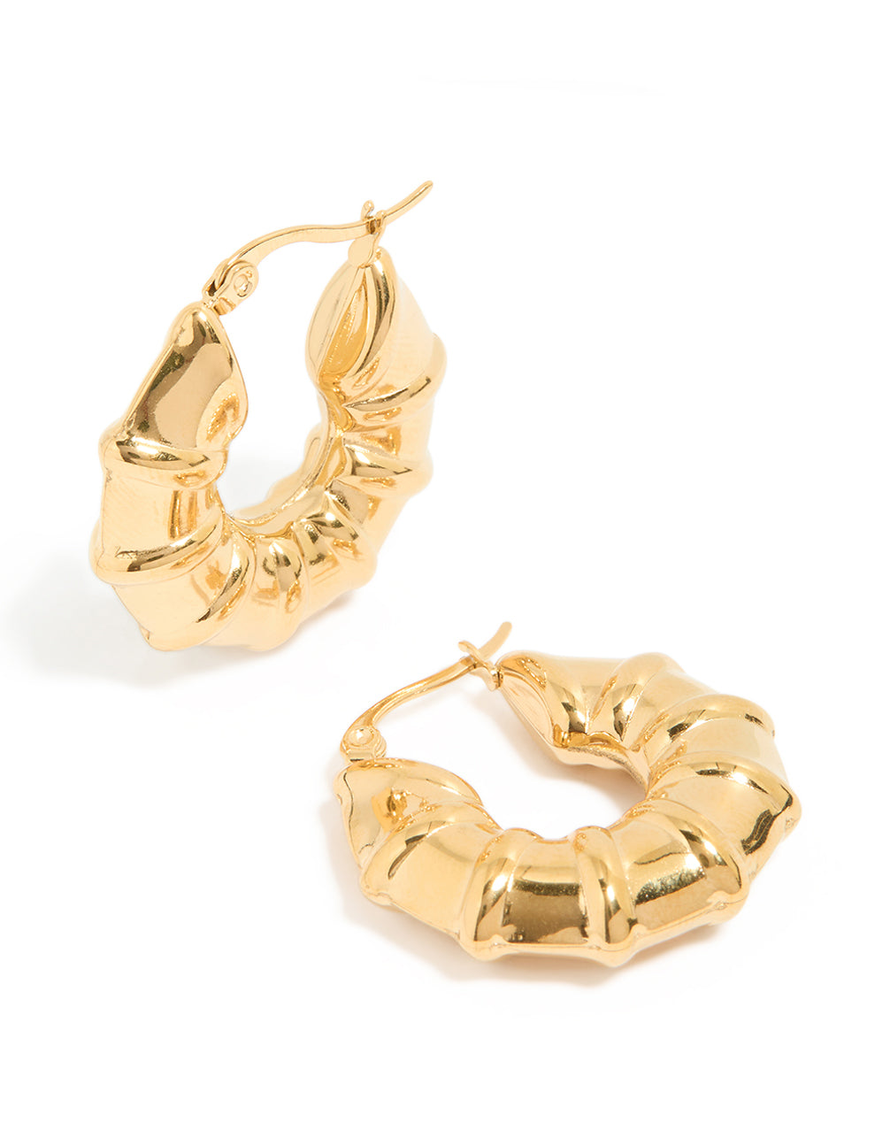 Featuring waterproof gold plated stainless steel barrel detail hoop earrings front view