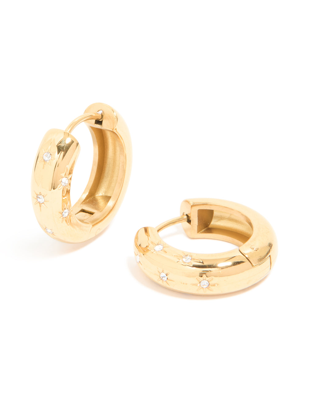 Pair of waterproof gold plated stainless steel diamante star huggie earrings featuring celestial design front view