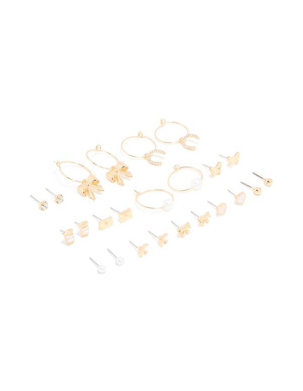 Explore this assorted 12-pack featuring bow, butterfly, charm, and pearl details in gold with white and ivory accents front view