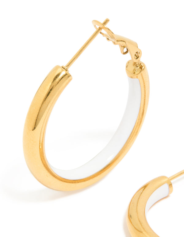 Presenting waterproof gold plated stainless steel half white enamel hoop earrings with post detail view