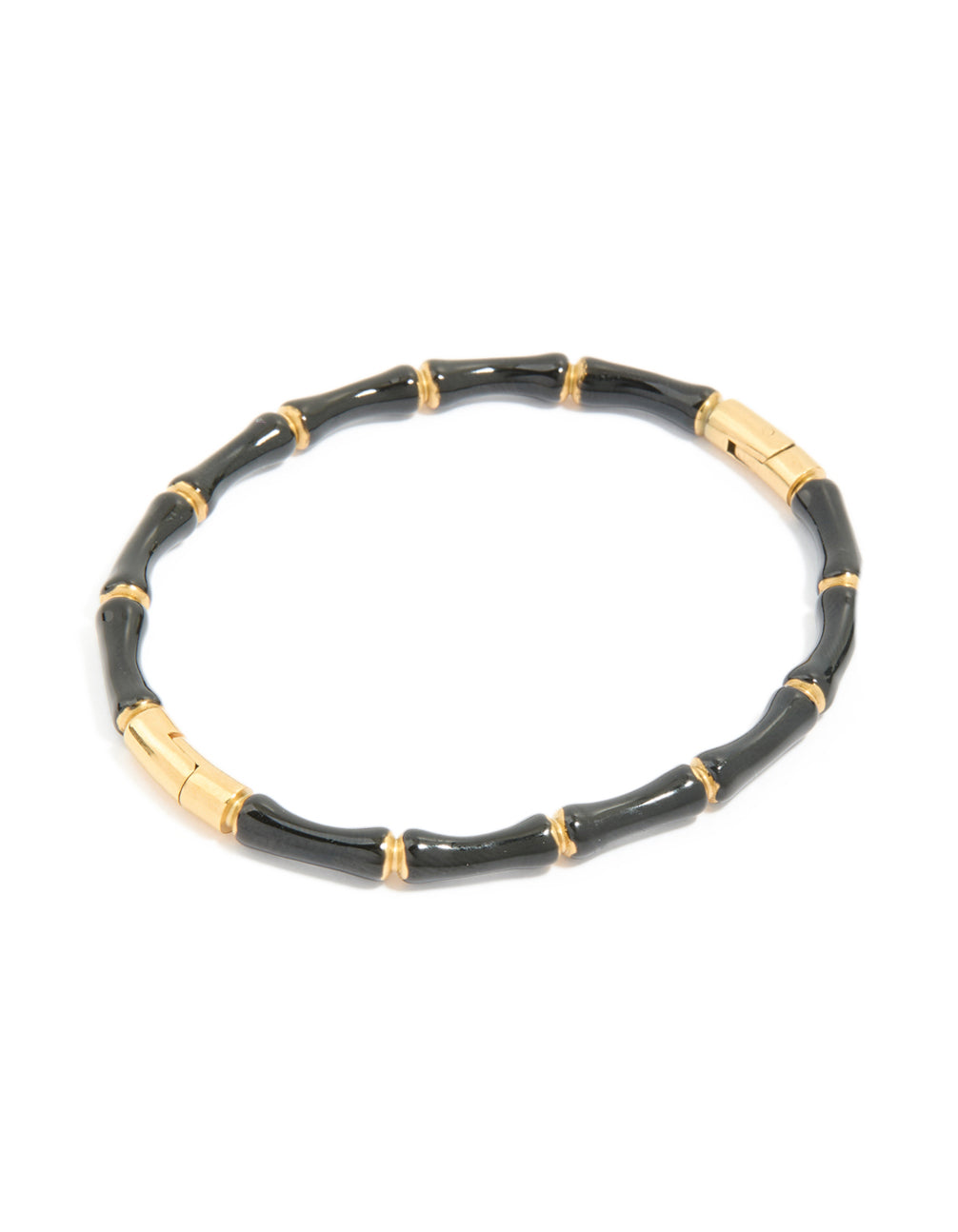 Featuring a waterproof gold plated stainless steel black enamel bamboo bangle with statement styling in front view