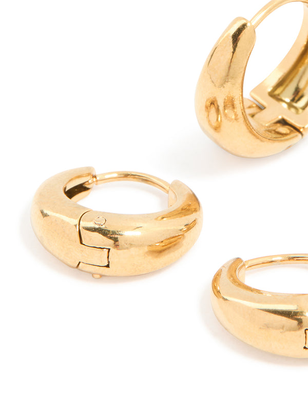 Crafted from waterproof gold plated stainless steel thick oval huggie earrings in a 2-pack with chunky style close up view