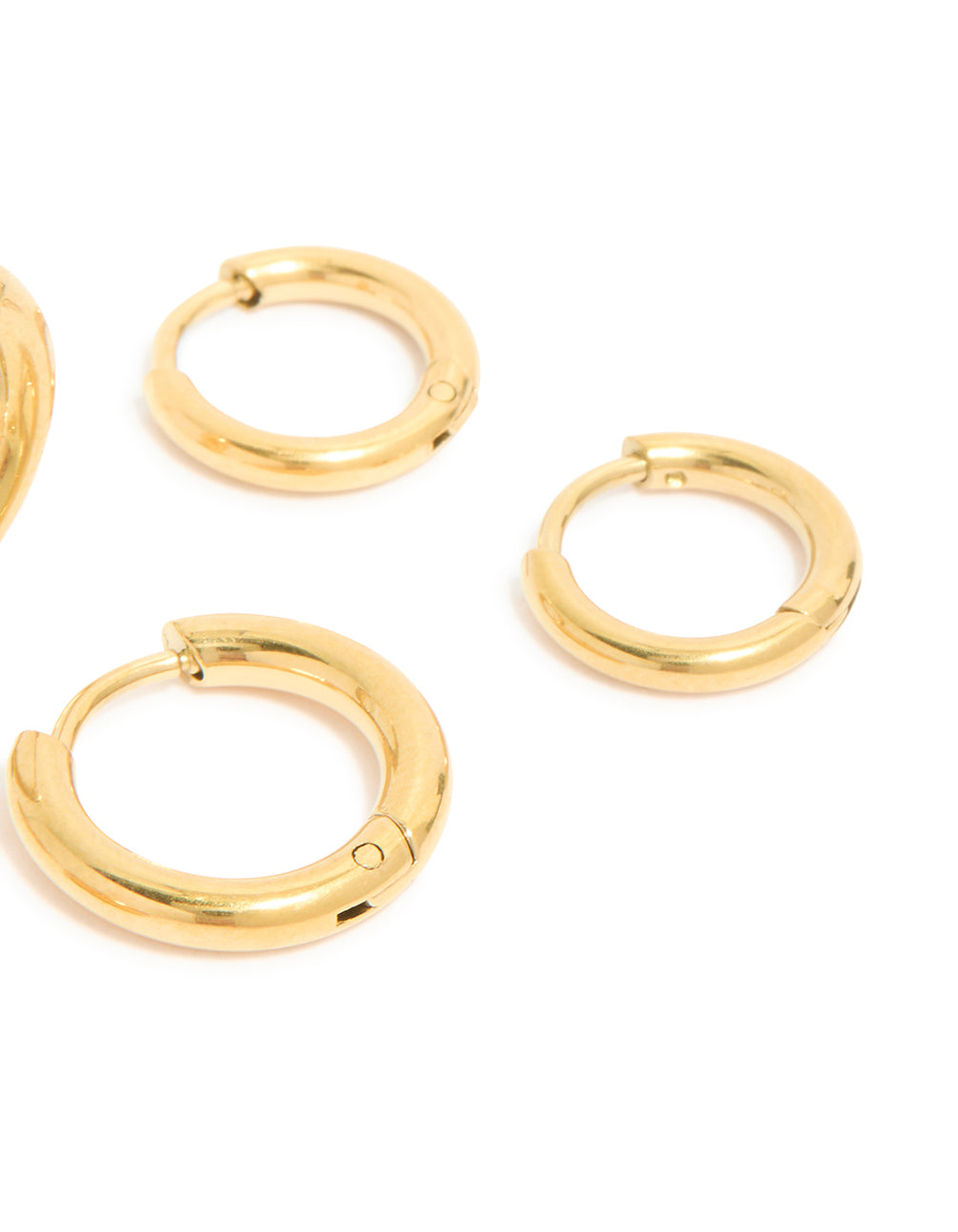 Presenting small huggie earrings in a 3-pack, fashioned with waterproof gold plated stainless steel post detail view