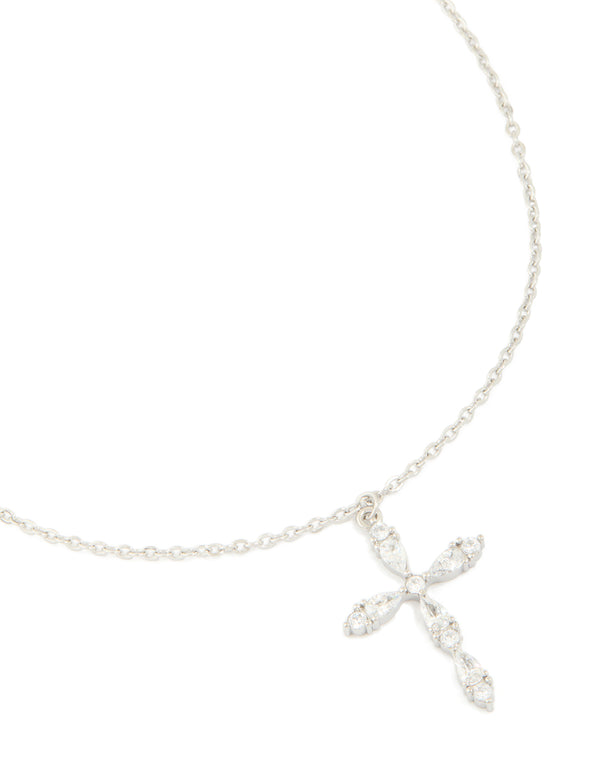 Showcasing a waterproof stainless steel multi cubic zirconia large cross necklace with statement styling in silver and clear close up view