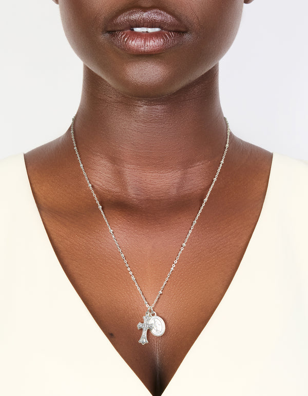 Elegant waterproof stainless steel necklace with mary charm,cross and balls in silver featuring statement styling on neck view