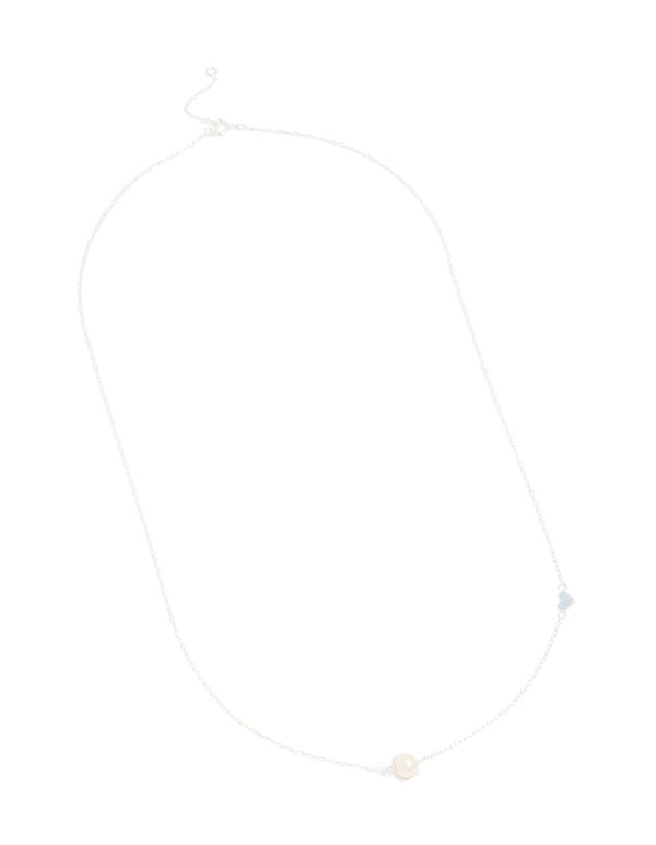 Featuring sterling silver with heart and pearl in complete design front view