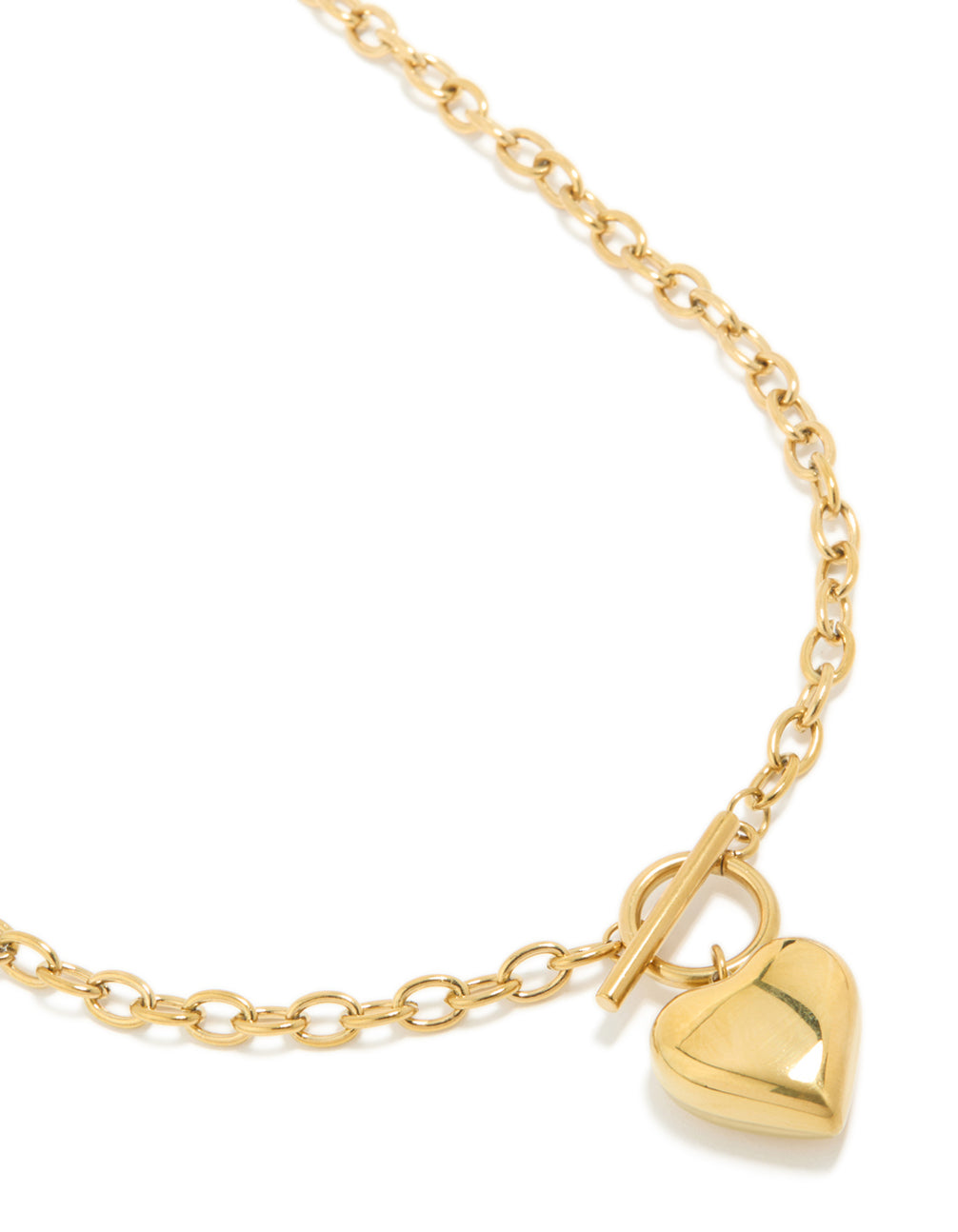Featuring waterproof gold plated stainless steel chunky heart pendant necklace with T&O toggle closure close up view
