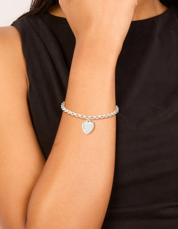 Showcasing a waterproof stainless steel chunky heart bracelet in silver on wrist view