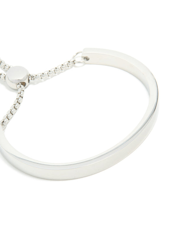 Presenting a waterproof adjustable toggle bangle crafted from stainless steel in silver close up view