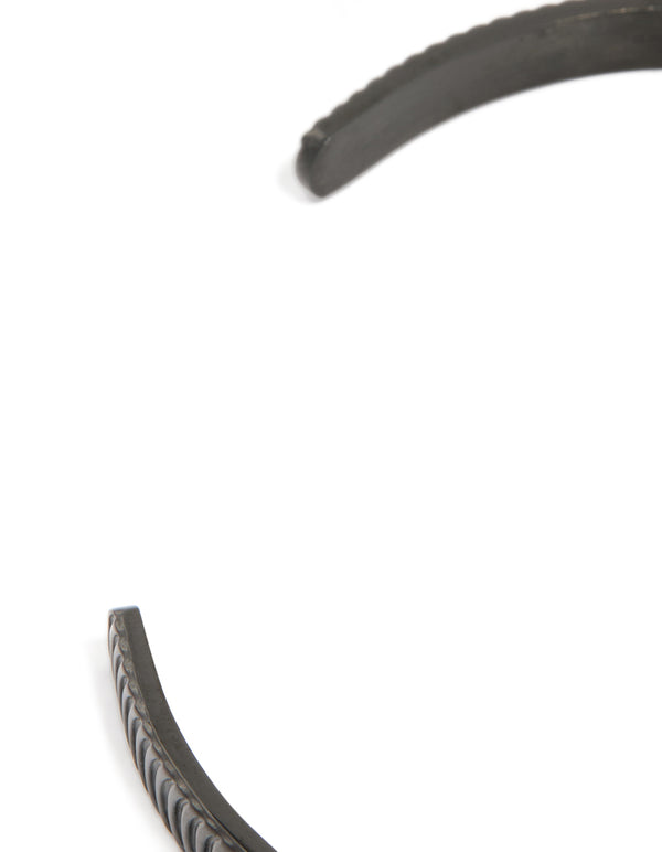 Crafted from waterproof black stainless steel, this mens detailed wrist cuff closure detail view