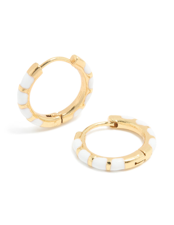 Crafted from waterproof gold plated stainless steel with white enamel bamboo huggie earrings front view