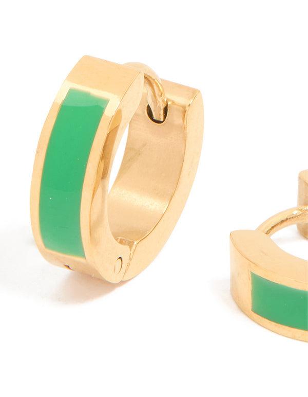 Crafted from waterproof stainless steel with gold plating and small green enamel inlay huggie closure close up view