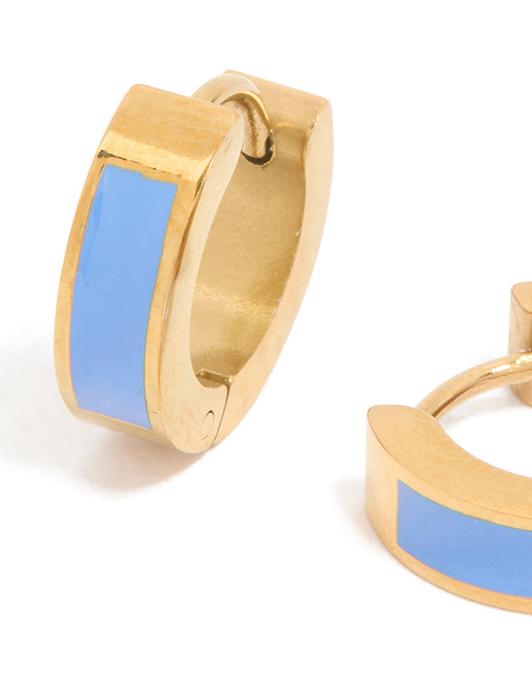 Designed with small waterproof blue enamel inlay huggie earrings in gold plated stainless steel close up view