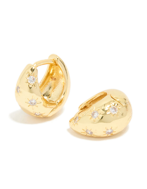 Featuring statement celestial huggie earrings crafted from gold plated cubic zirconia front view