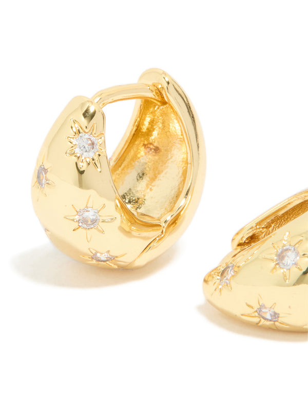 Detailed view of statement celestial huggie earrings crafted from gold plated cubic zirconia close up view