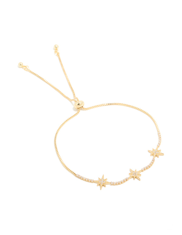 Stylish gold plated cubic zirconia stars toggle bracelet with celestial design front view