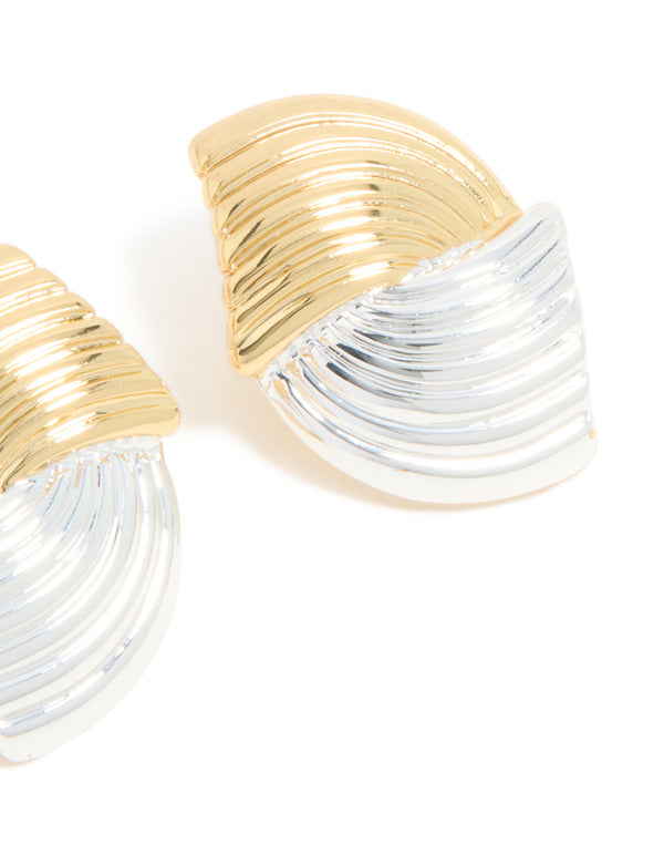 Highlighting mixed metal plated wavy ribbed stud earrings in gold and silver post detail view