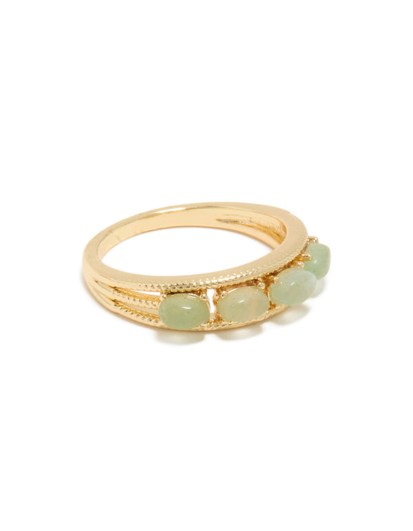 Elegant gold plated vintage statement ring with pale green pebbles side detail view
