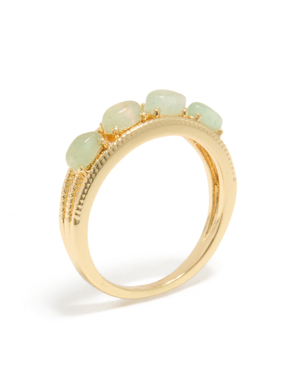 Discover the gold plated vintage statement ring with pale green pebbles side view