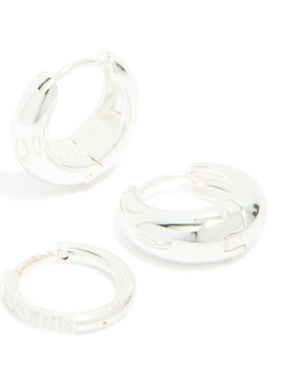 Highlighting waterproof stainless steel cubic zirconia and chubby huggie earrings 2-pack with crystal silver chunky post detail view