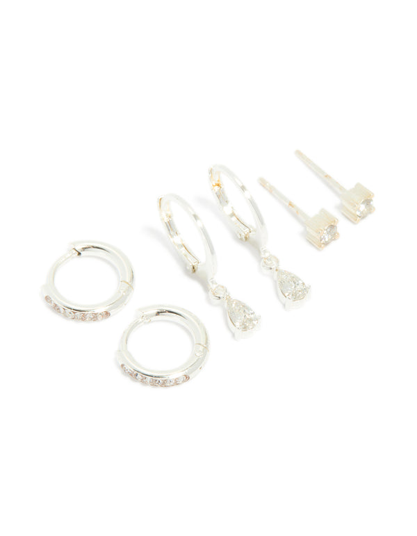 Featuring waterproof stainless steel cubic zirconia simple stud and huggie earrings in a 3-pack and silver finish front view