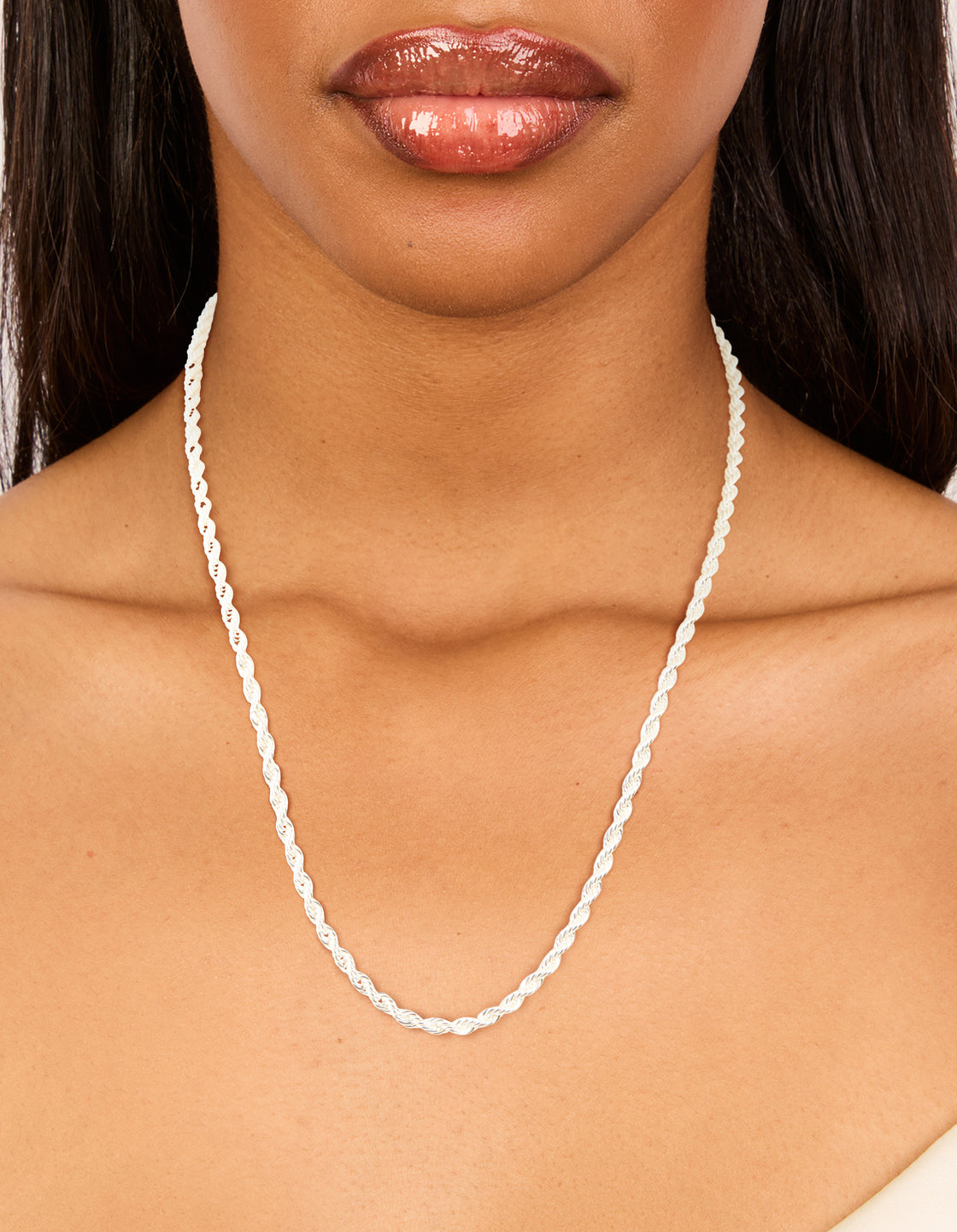 Presenting a waterproof stainless steel twist chain necklace in silver for statement style on neck view