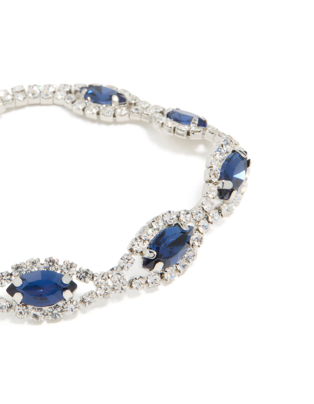 Designed with silver and blue diamante bracelet highlighting shiny pear cut stone settings in close up view