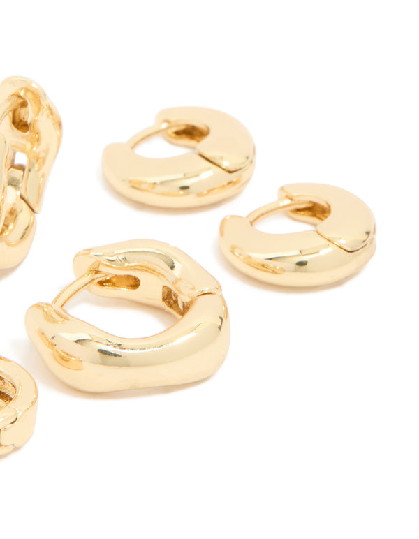 Crafted from gold plated brass with emerald cut cubic zirconia in green, these chunky huggie earrings from a 4-pack show post detail view
