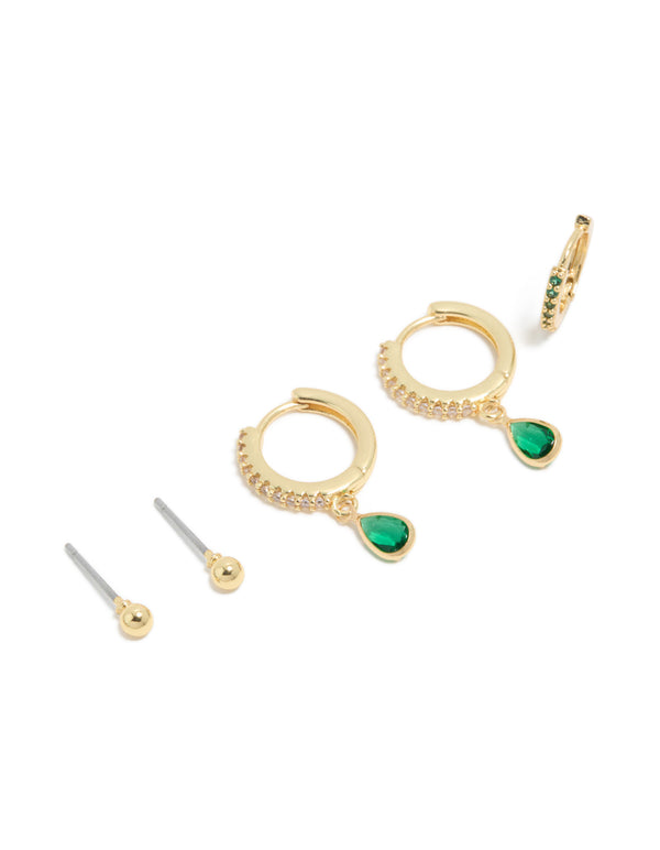 Featuring dainty gold plated brass emerald cubic zirconia May birthstone earrings 4-pack with balls details, huggie and stud closure, and crystal green accents close up view