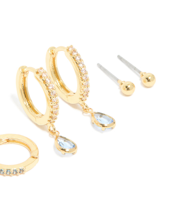 Displaying gold plated brass aquamarine cubic zirconia March birthstone earrings with ball detail 4-pack with crystal embellishments post detail view