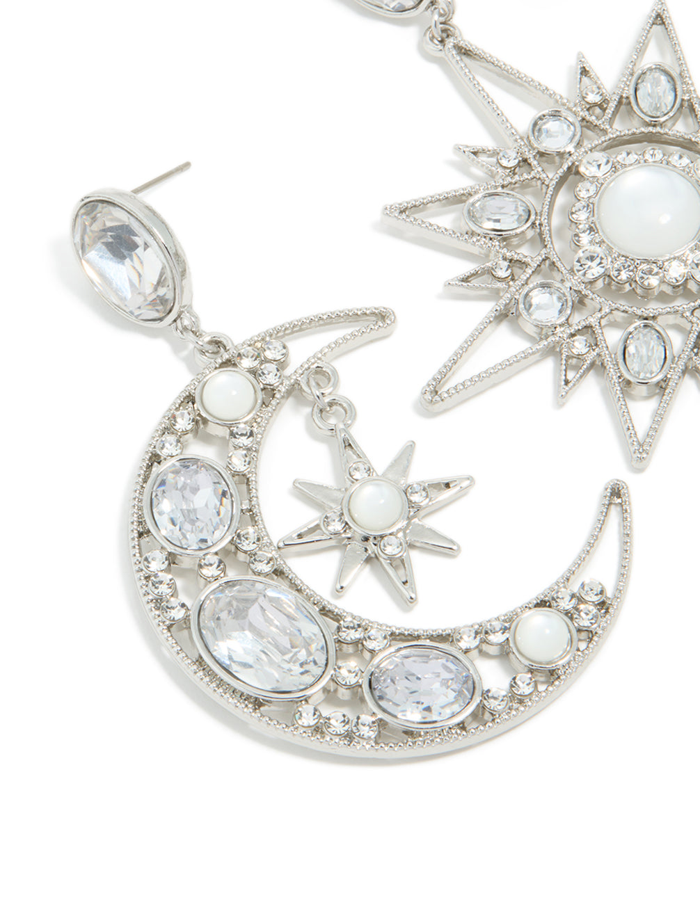 Designed with statement silver diamante star and moon earrings featuring celestial motifs and stud closure in close up view