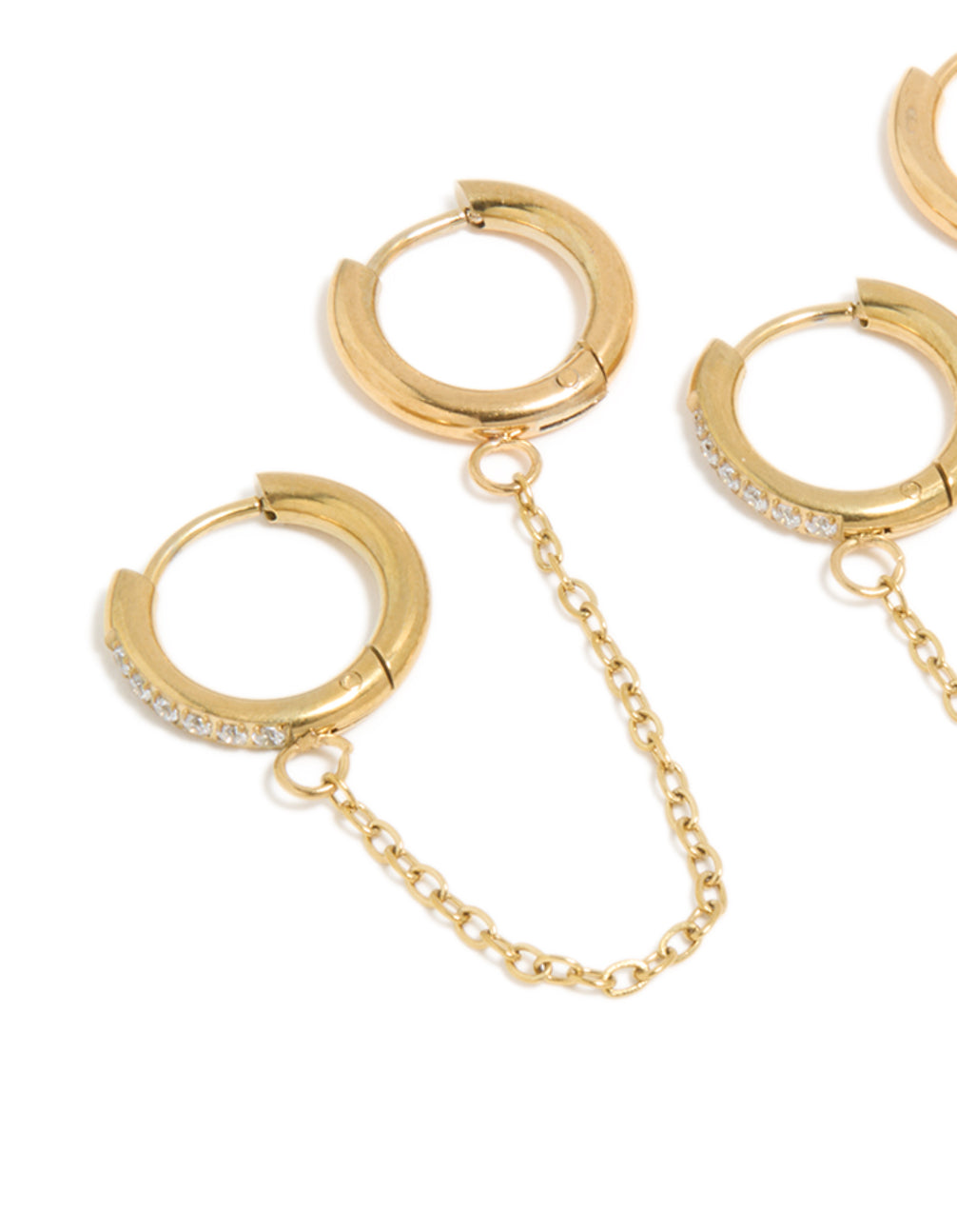 Presenting waterproof chain link huggie earrings in a 2-pack, with gold plated stainless steel and cubic zirconia in close up view