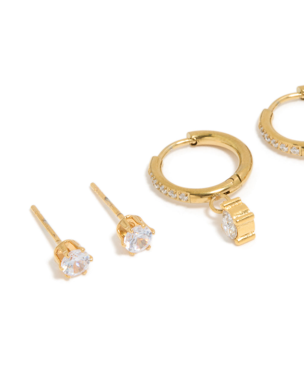 Featuring waterproof gold plated stainless steel cubic zirconia stud and huggie earrings in a 3-pack with crystal close up view