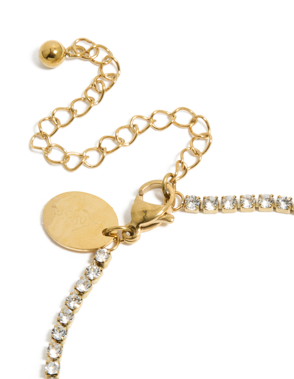 Waterproof gold plated stainless steel tennis bracelet with cubic zirconia stones and letter J initial in closure detail view