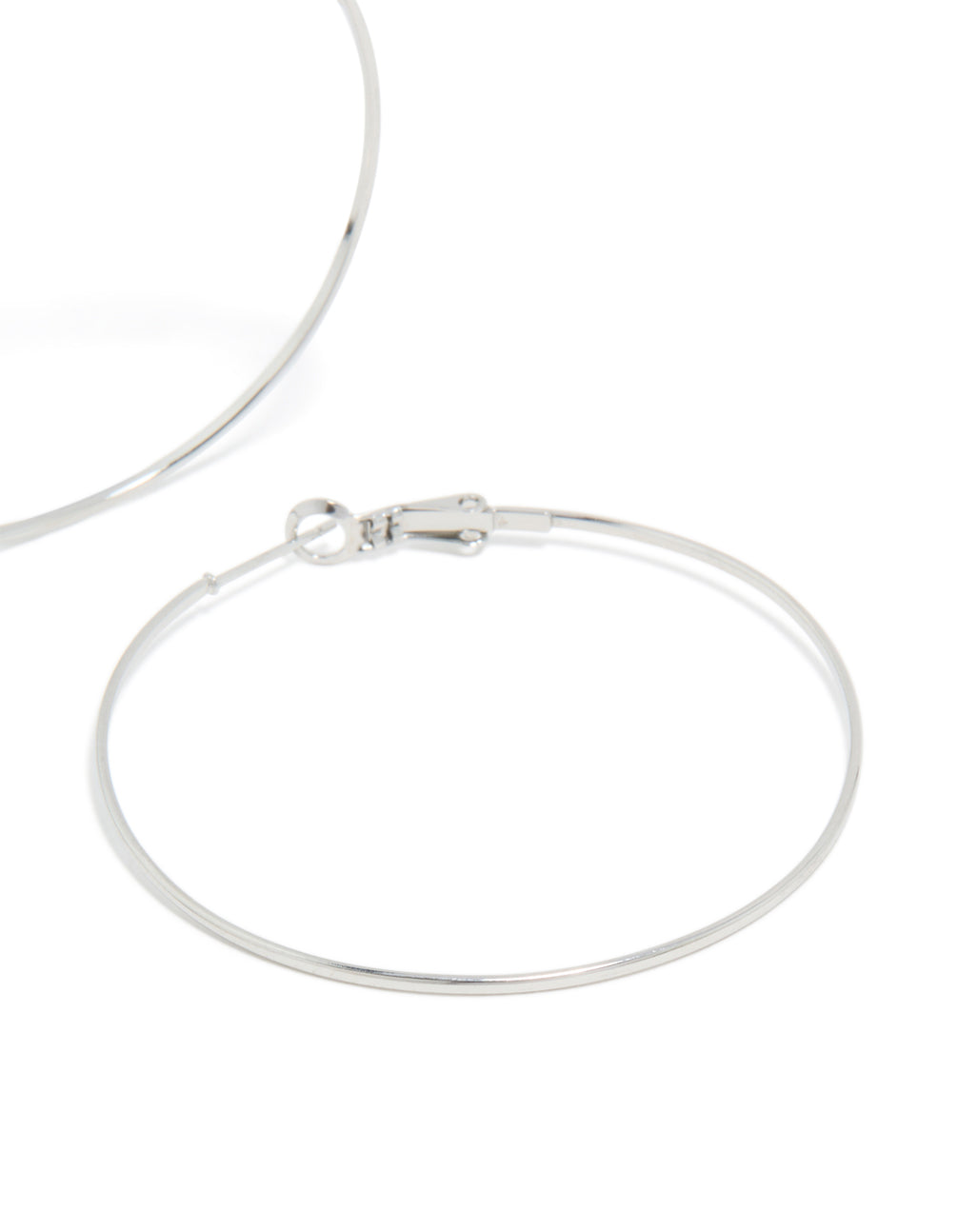 Crafted from surgical steel fine hoop earrings in silver, 50 MM post detail view