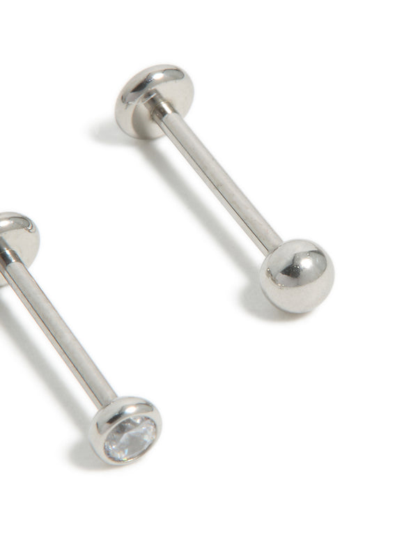 Designed with titanium bezel cubic zirconia threadless flat back nose studs featuring ball accents in silver close up view