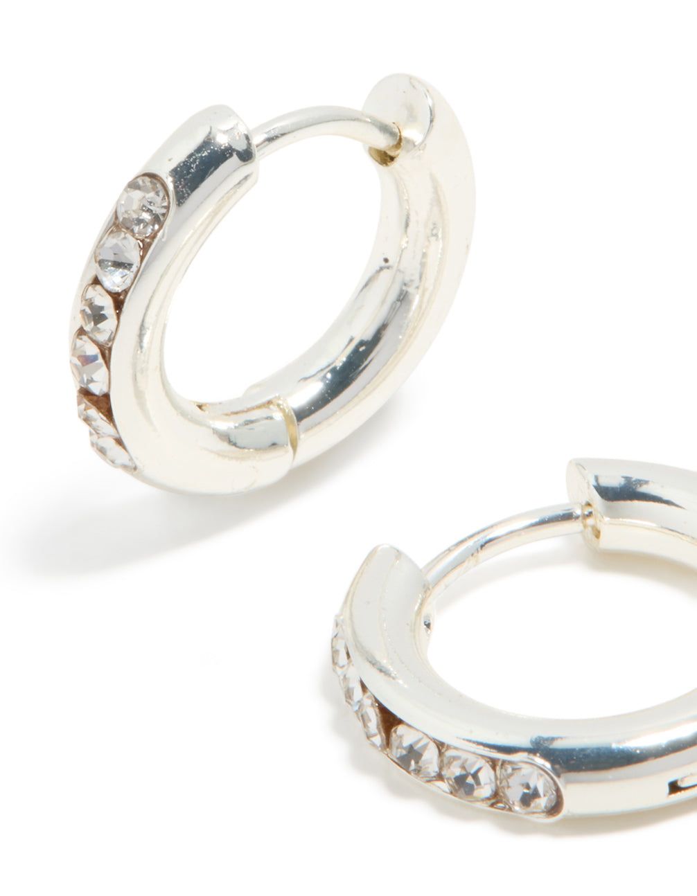 Detailed view of waterproof stainless steel round diamante clicker hoop earrings in silver close up view