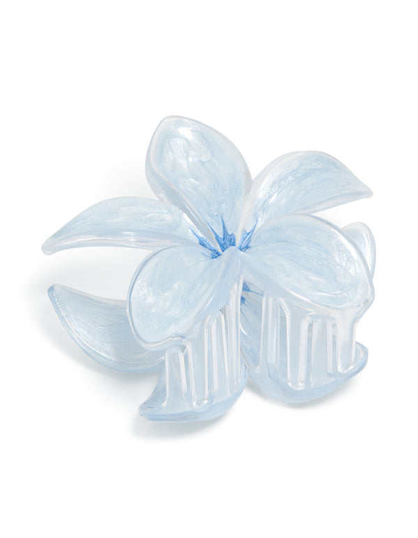Discover this light blue clear edge frangipani flower claw clip featuring floral design front view