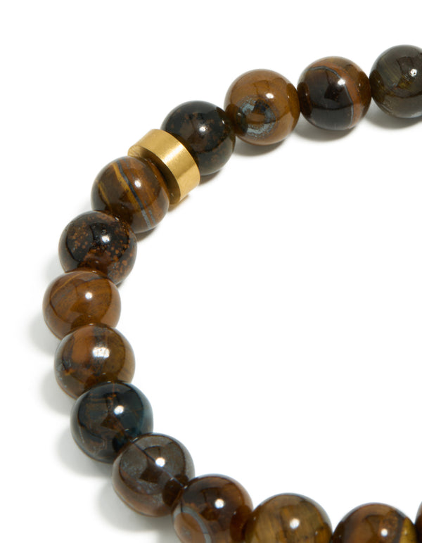 Highlighting mens waterproof stainless steel tiger's eye beaded bracelet in close up view
