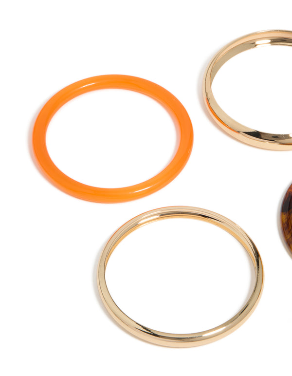 Featuring gold, brown and orange acrylic bangle 4-pack with close up view