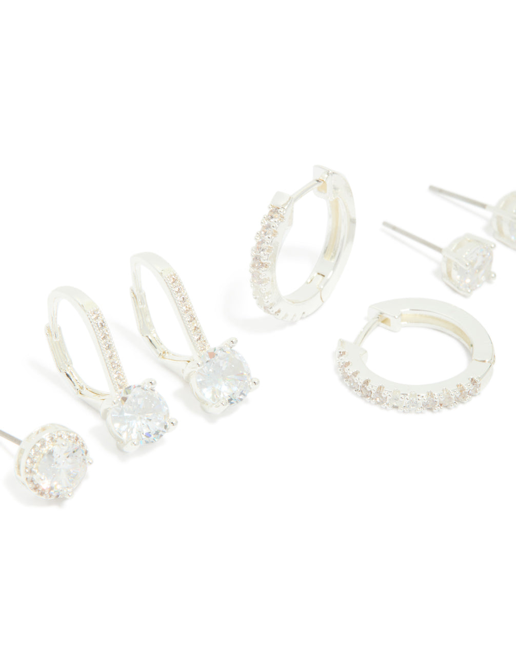 Featuring silver plated cubic zirconia mixed stud and huggie earrings in a 4 pack close up view