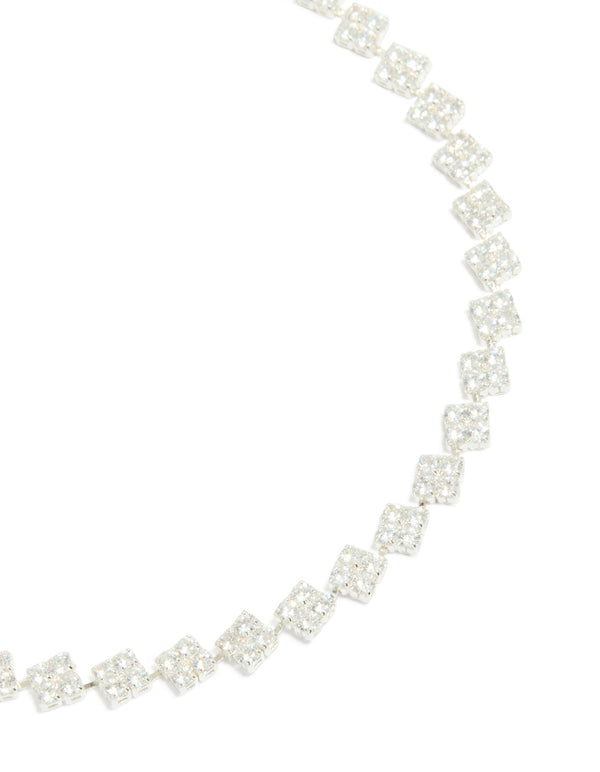 Showcasing silver plated cubic zirconia multi flower necklace in statement style close up view