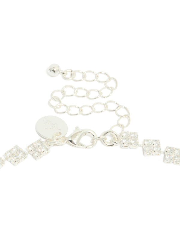 Highlighting silver plated cubic zirconia multi flower necklace in statement style clasp detail view