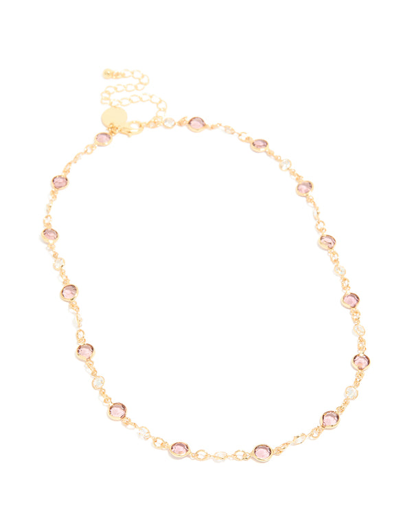 Presenting a gold plated station necklace with pink and clear cubic zirconia stones in round cut front view