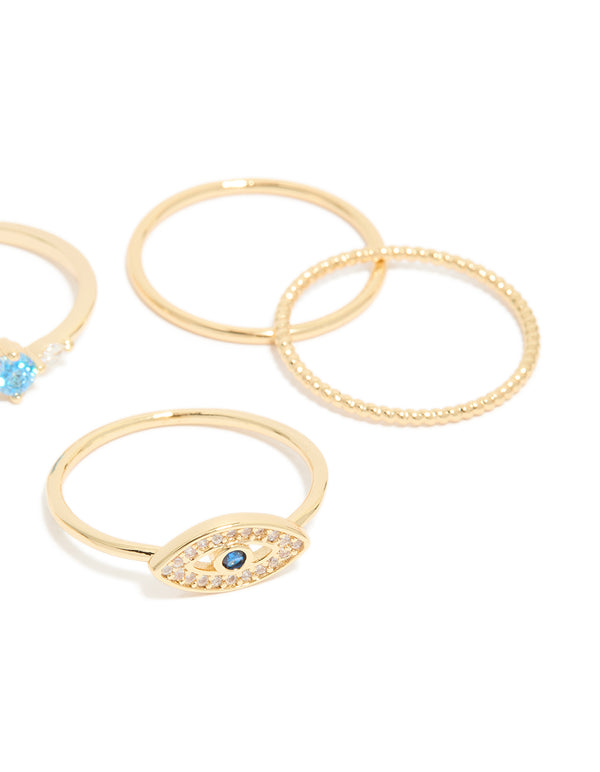 Crafted from gold plated material, these cubic zirconia and evil eye rings 5-pack showcase crystal accents detail view