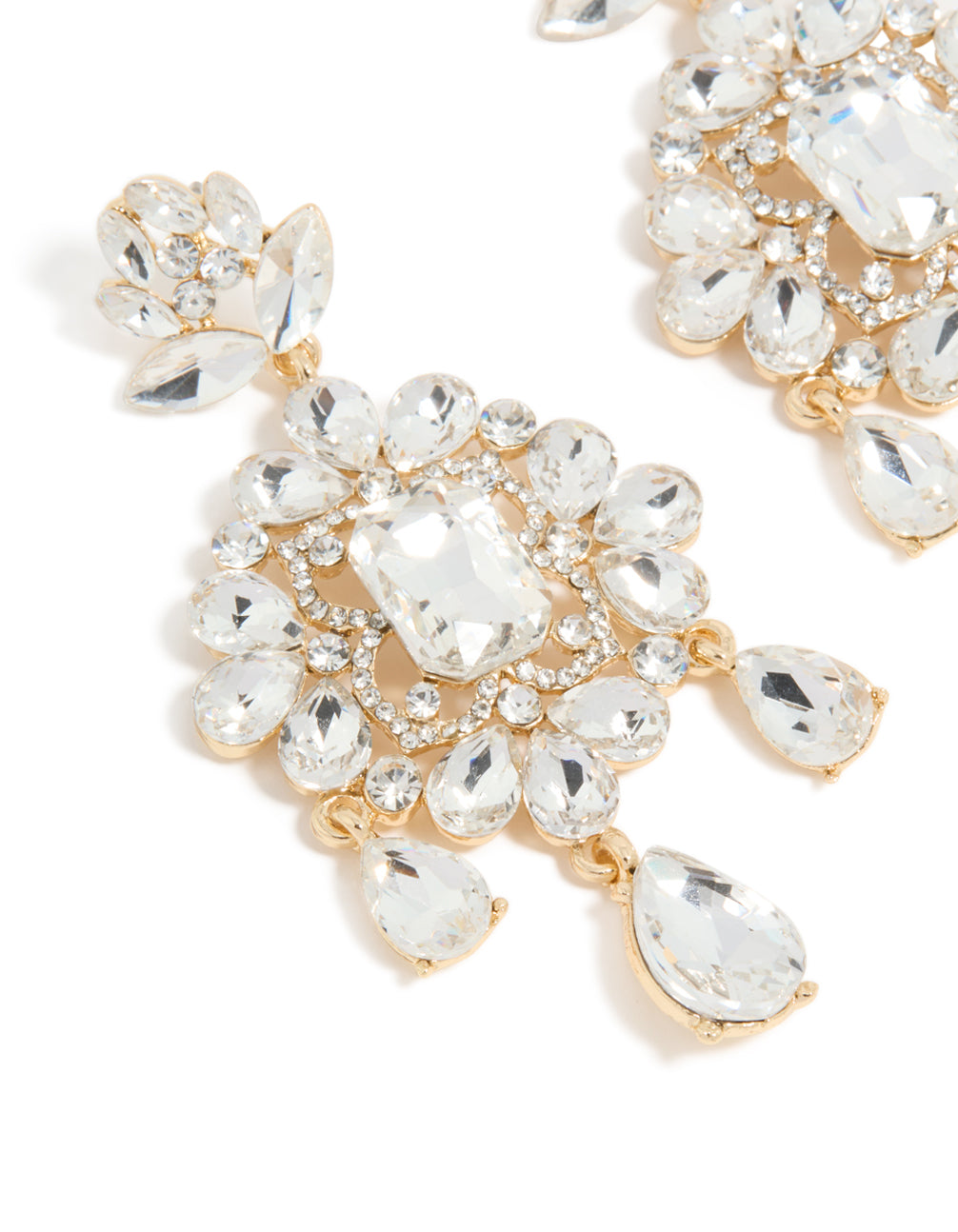 Beautifully crafted statement drop earrings in gold with clear diamante close up view